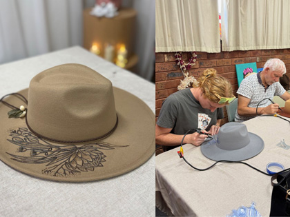 People using  hot tool to burn designs into a hat