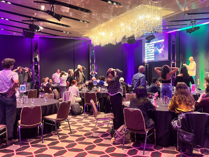 People playing trivia in the RACV City Club
