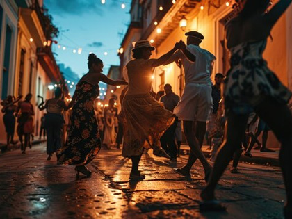 People dancing in the street at nighttime