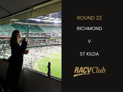 Crowd at a footy game with the name of the round and teams playing.