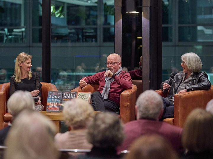 Author speaking in front of Club members at RACV City Club.