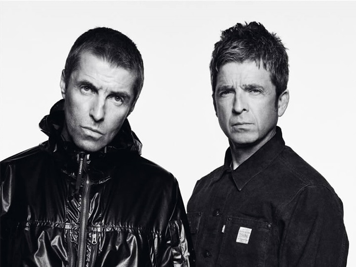 Black and white image of the Oasis band members