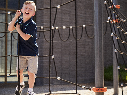 Child playing on jungle jim