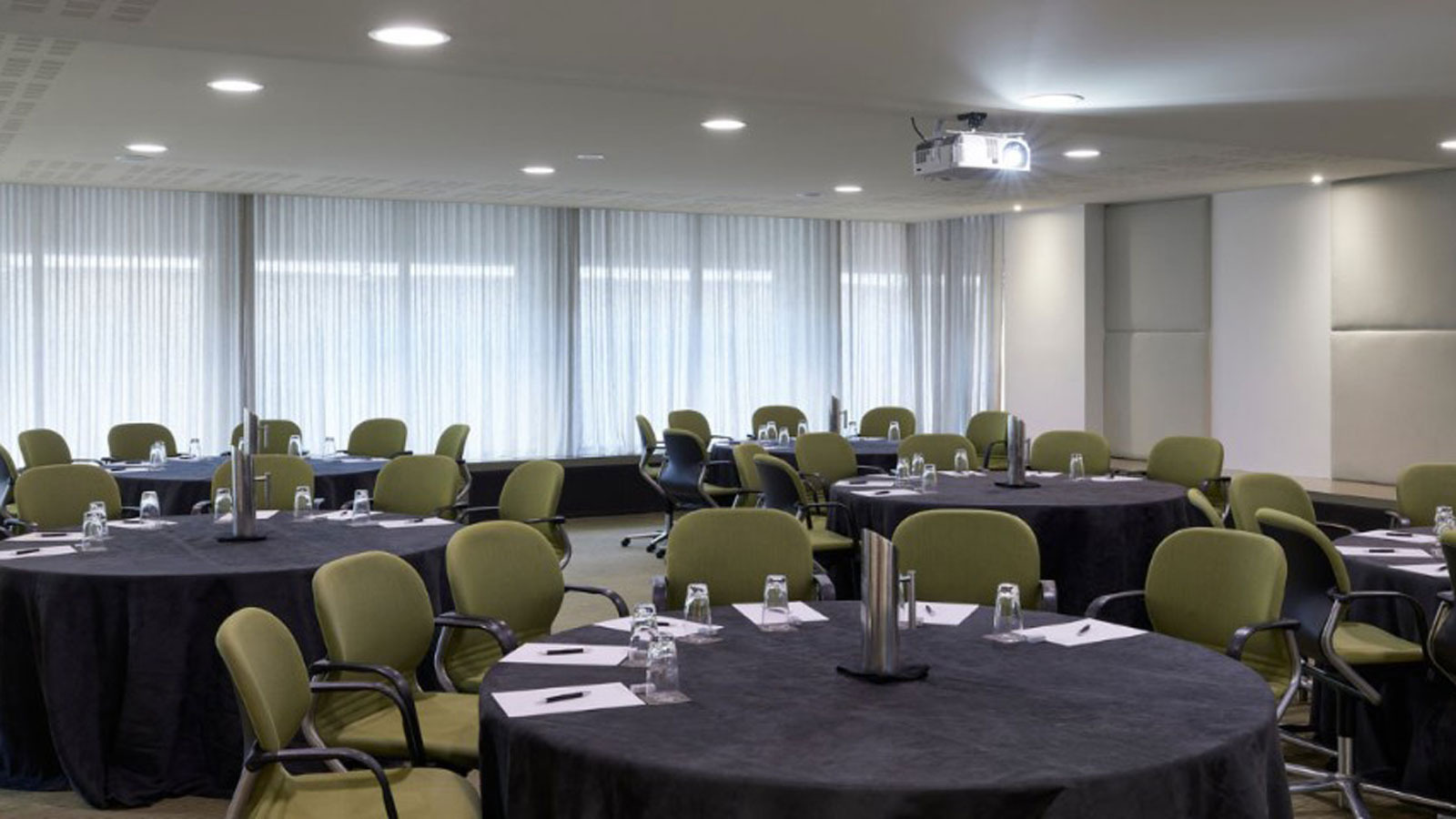 Barak conference room set with circular tables.