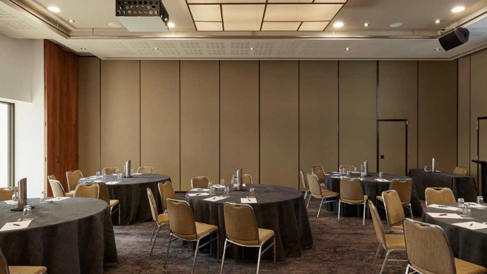 Day room set up for a conference banquet style.