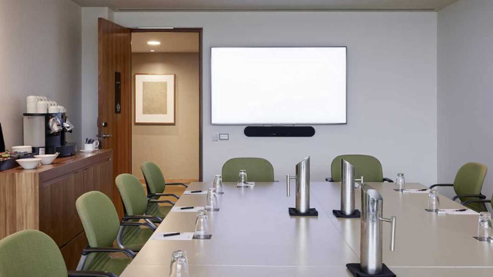 Syndicate conference room with screen.
