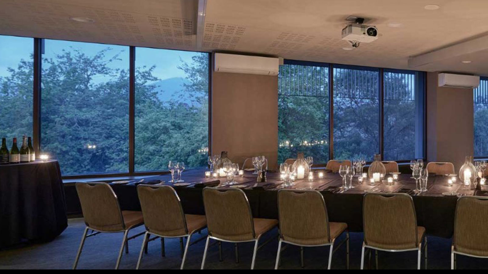 Watts room set up for dinner service and wine.