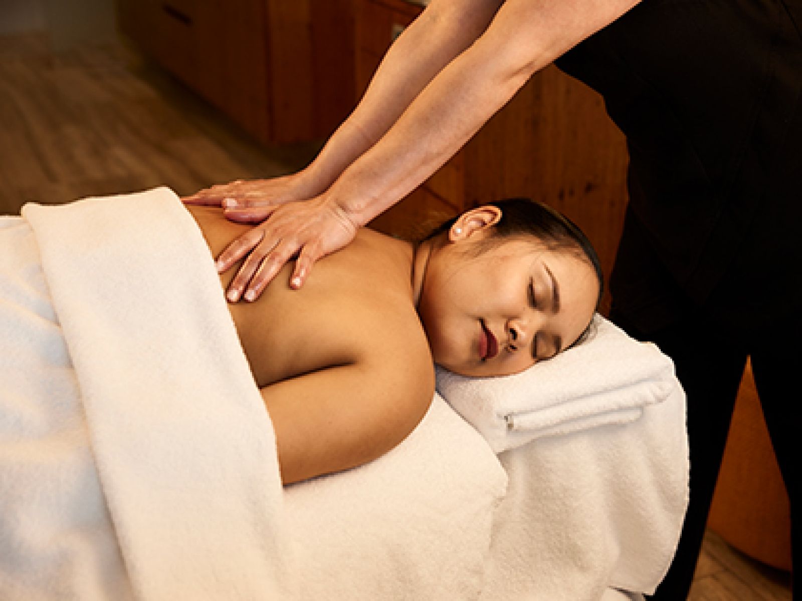 Person getting a back massage at RACV Healesville Country Club & Resort's One Spa.