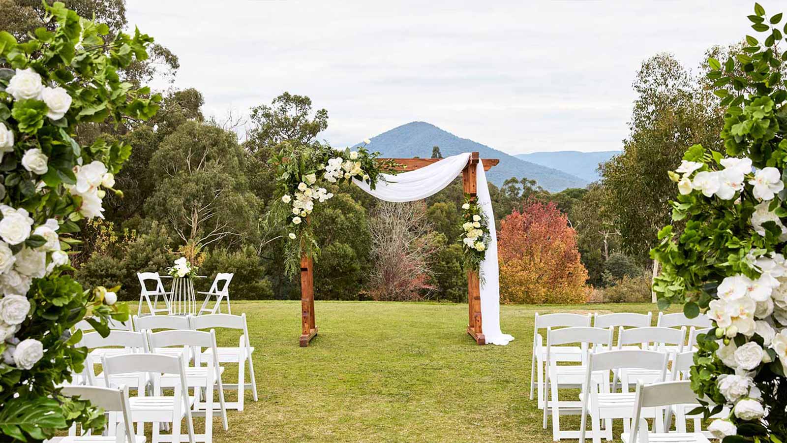 Outdoor wedding ceremony set up with arbour at the Healesville Country Club and Resort.