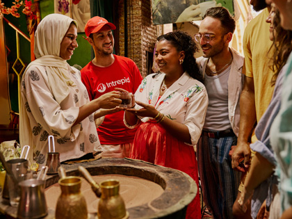 A group of people trying coffee in Morrocco.
