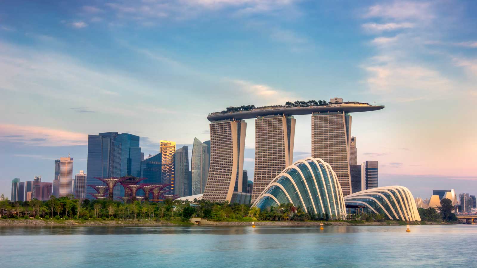 Marina Bay Sands Hotel and skyline of singapore from a distance.