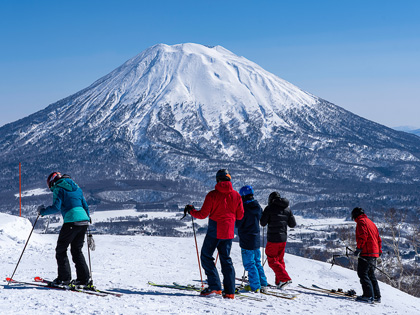 Group Ski Activity at Niseko winter Yotei mountain background.