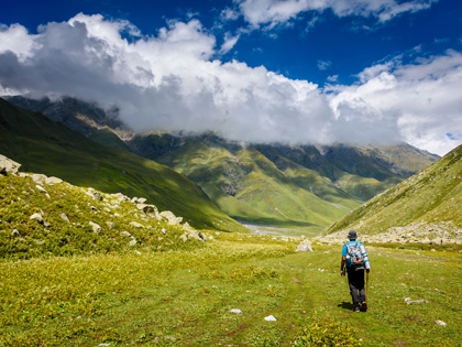 Man hiking in he scenic Pin Bhabha Pass Trail.
