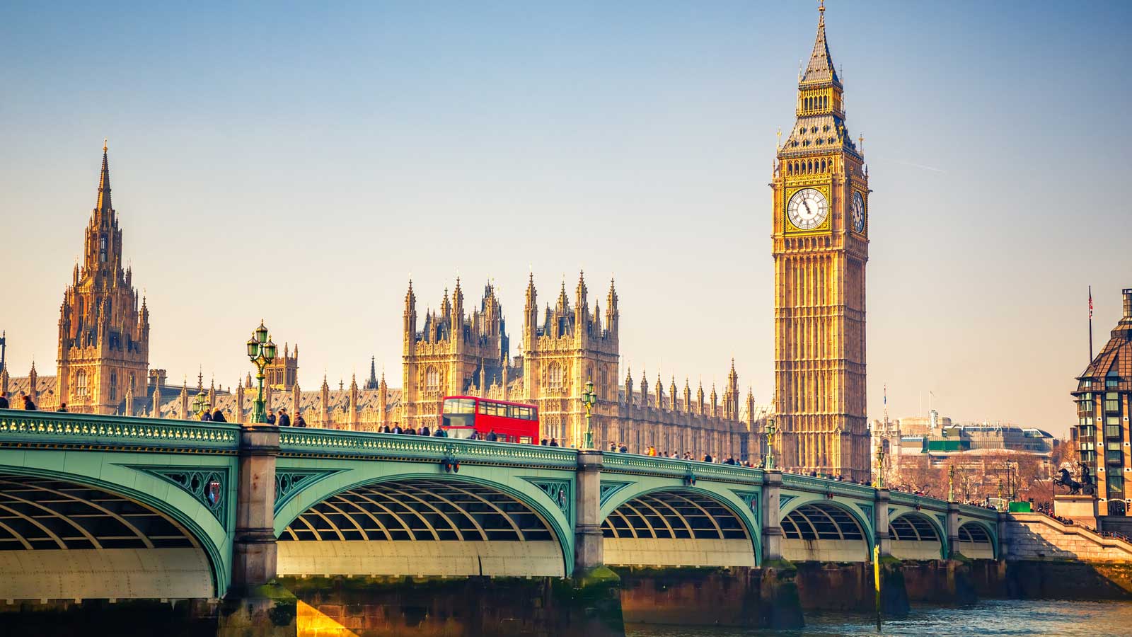 London Bridge and Big Ben at golden hour.