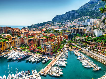 Monaco Monte Carlo township and boats from an aerial sea view.