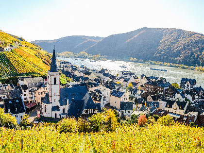 A small European riverside town.