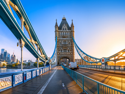 The famous tower bridge of london during sunrise.
