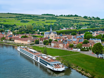 Long cruise ship docked on the Seine