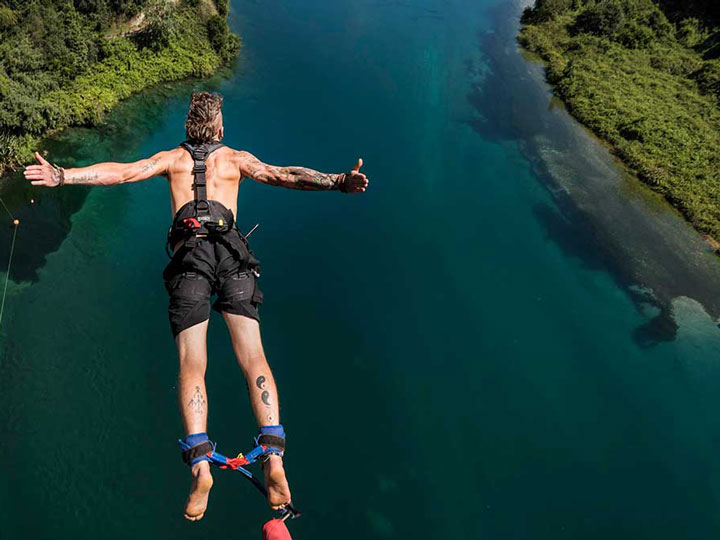 Man bungee jumping in New Zealand