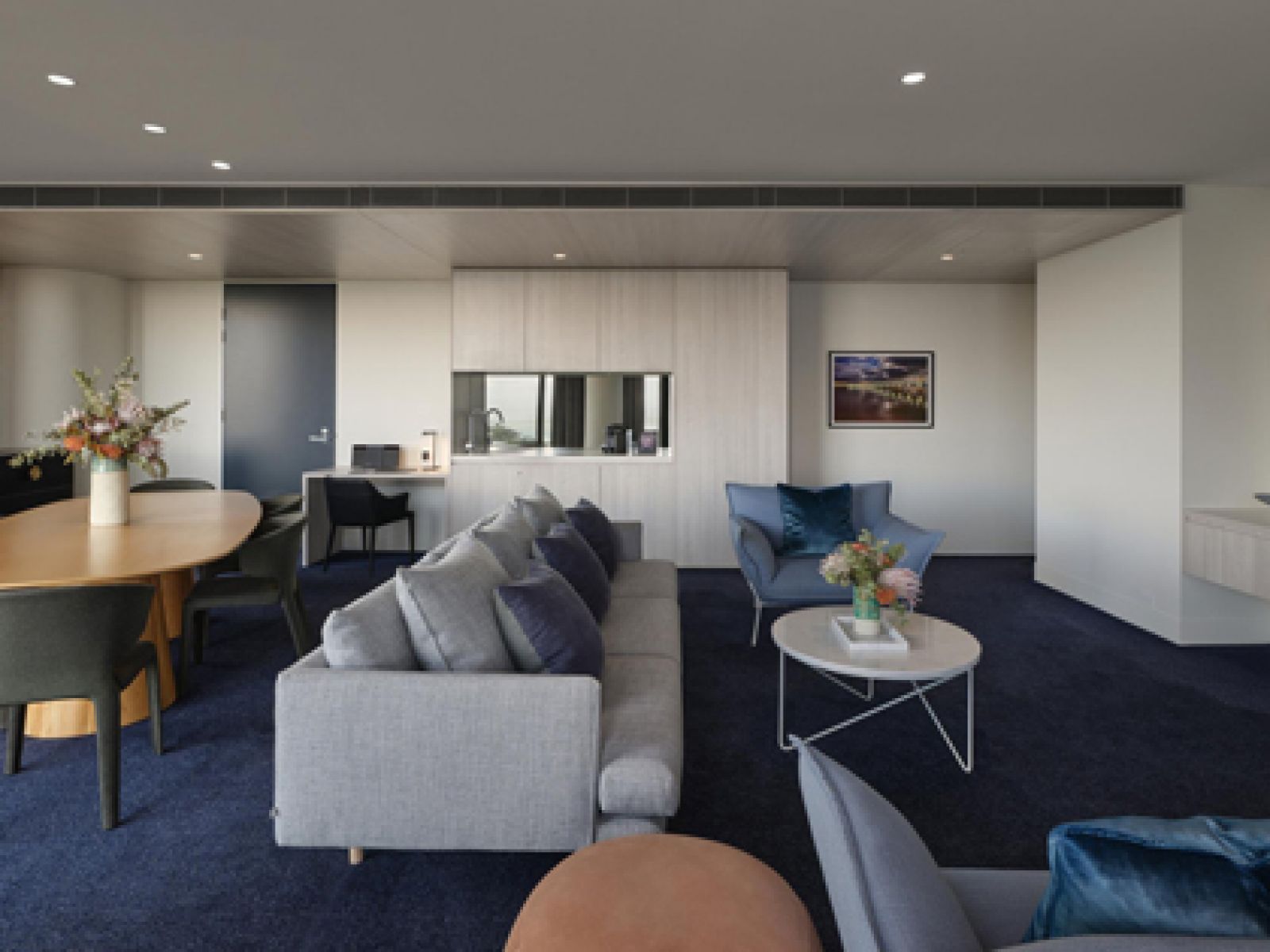 The lounge and outdoor view at RACV Cape Schanck Resort's Peninsula Suite