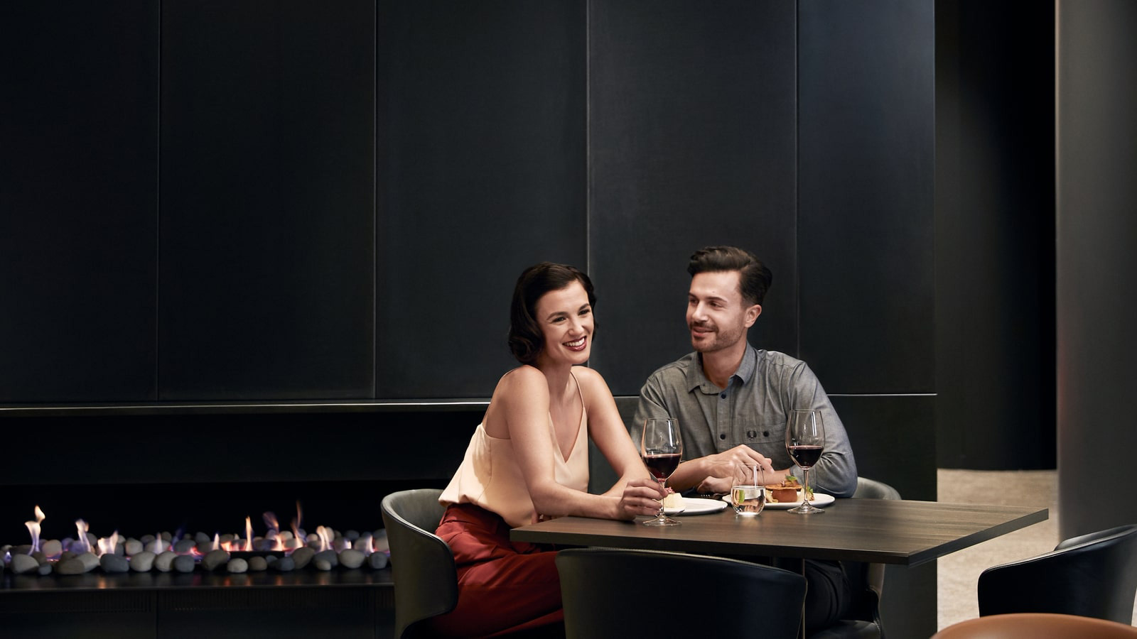 A young couple enjoying some wine in Cape.