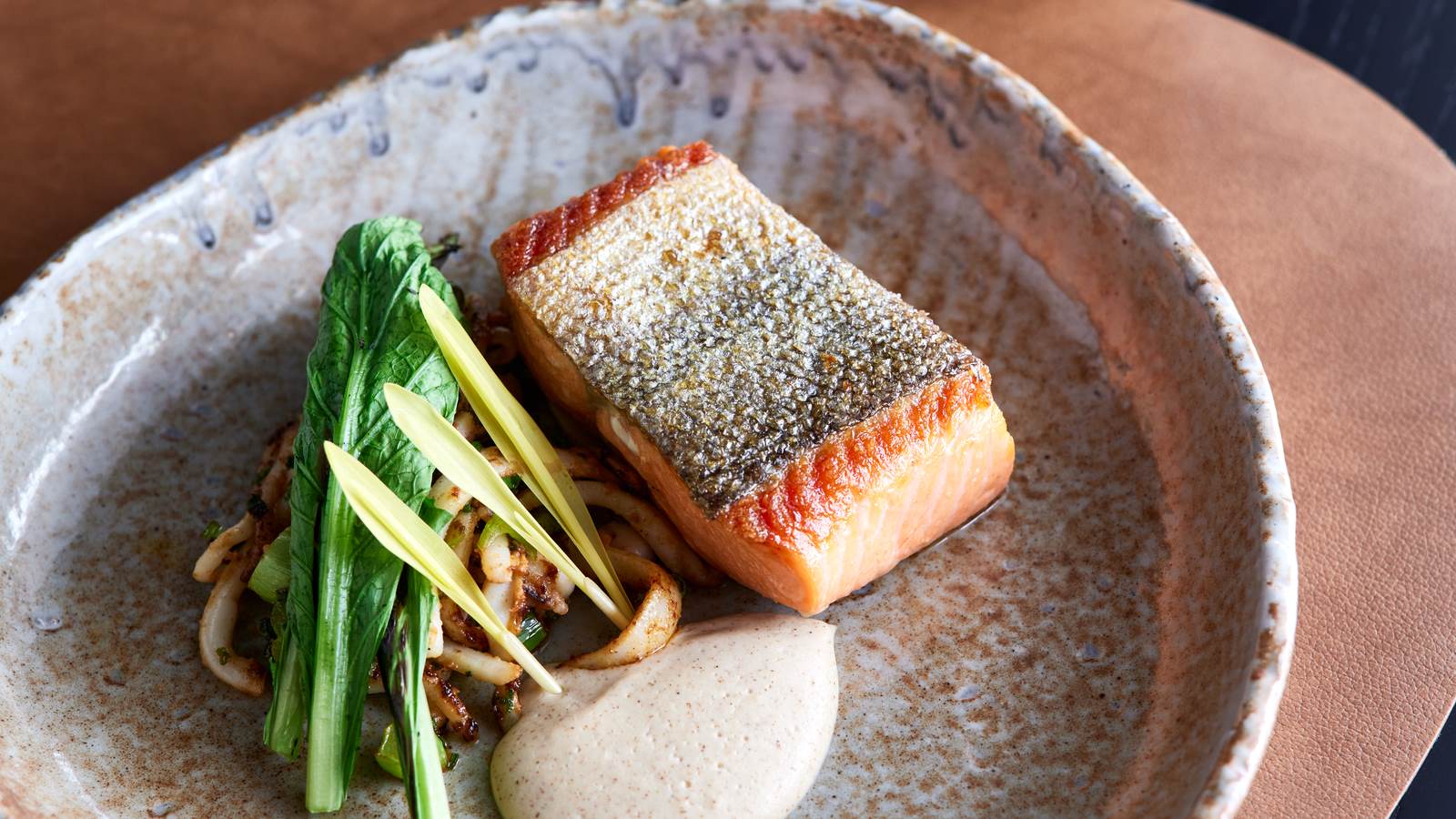 New Zealand King Salmon Fillet with mustard greens, roasted calamari and ajo blanco