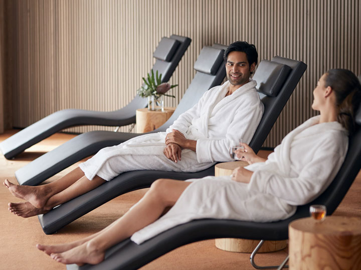 Couple sitting down at One Spa