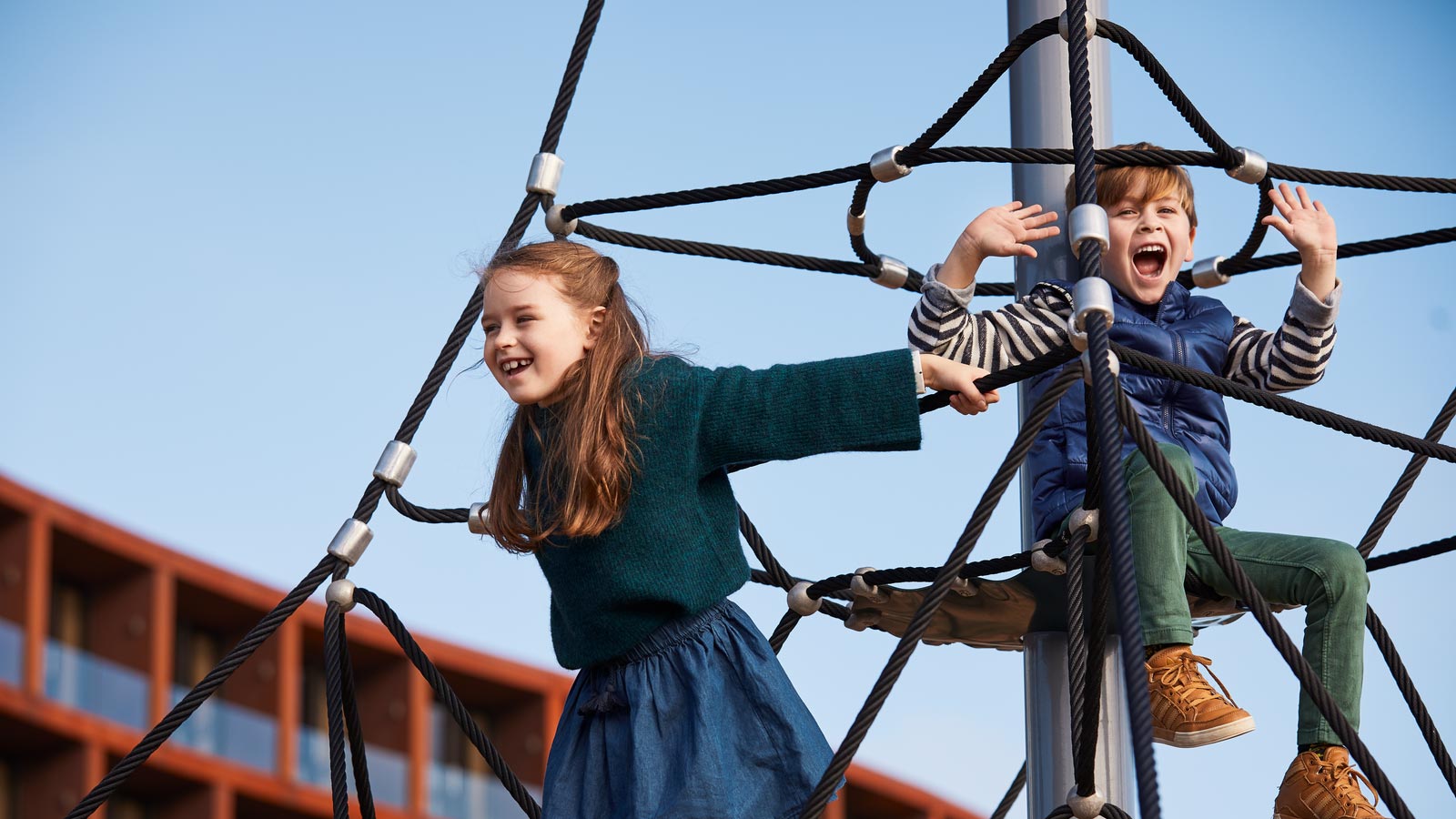 Child playing on playground ropes at RACV Cape Schanck Resort.