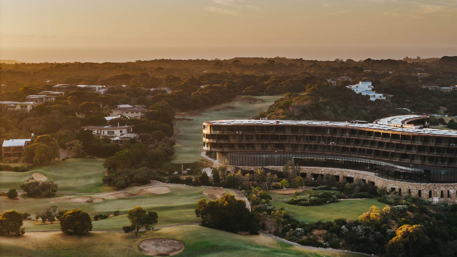 Aerial view of Cape Schanck resort and golf course at dusk.