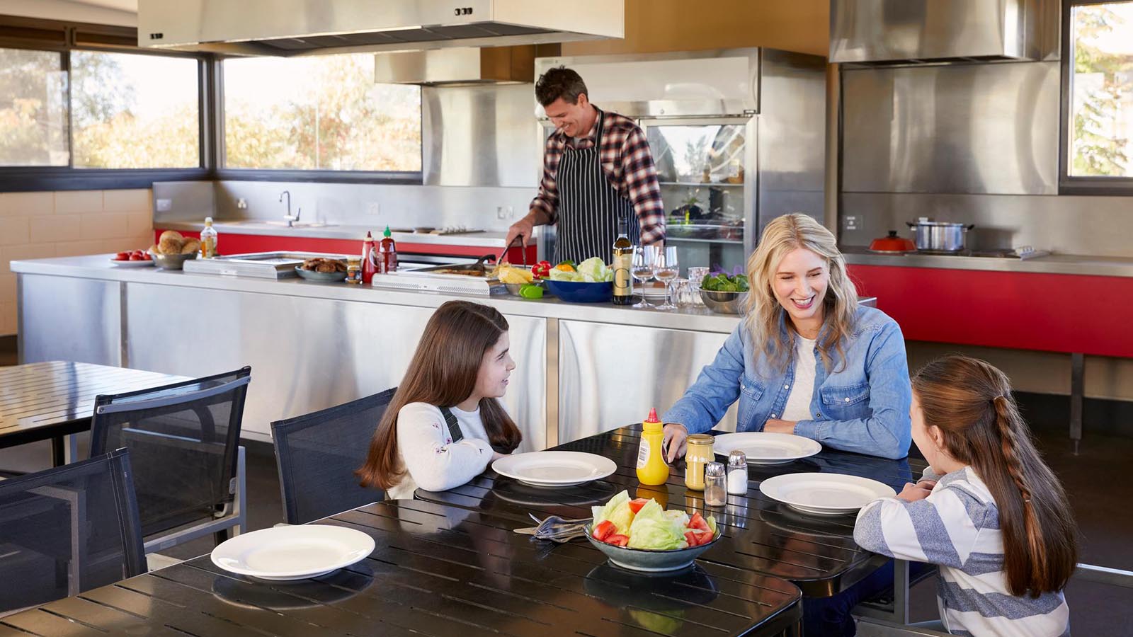 A family enjoying the bbq facilities at the Cobram resort.