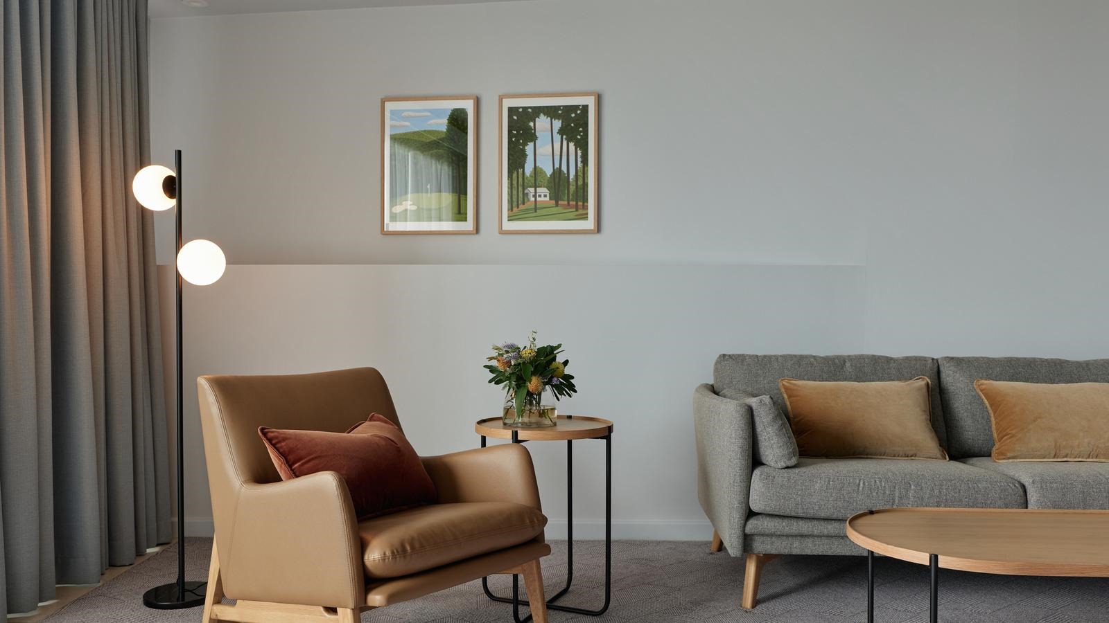 An interior view of the living area in the Premium Fairway Suite at Goldfields.