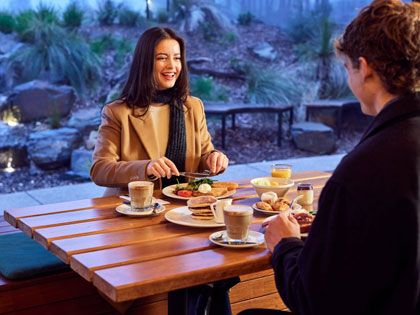 Couple having breakfast together at RACV Goldfields