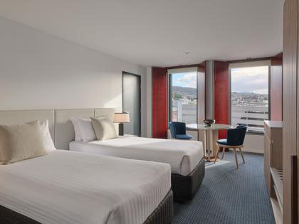 The bedroom of a twin single room at the RACV Hobart Hotel.