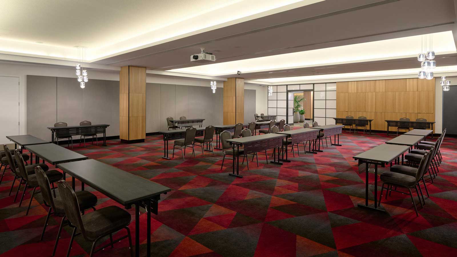 Collins room set up with tables and seating.