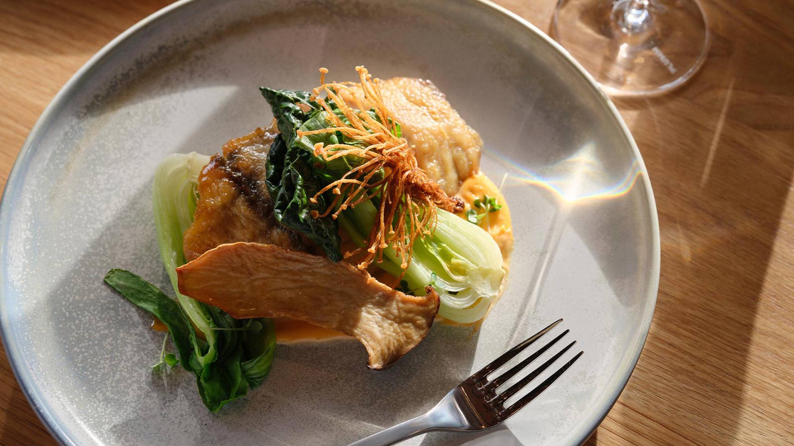 Fish and green vegetables served at RACV Hobart Hotel's Charcoal restaurant.