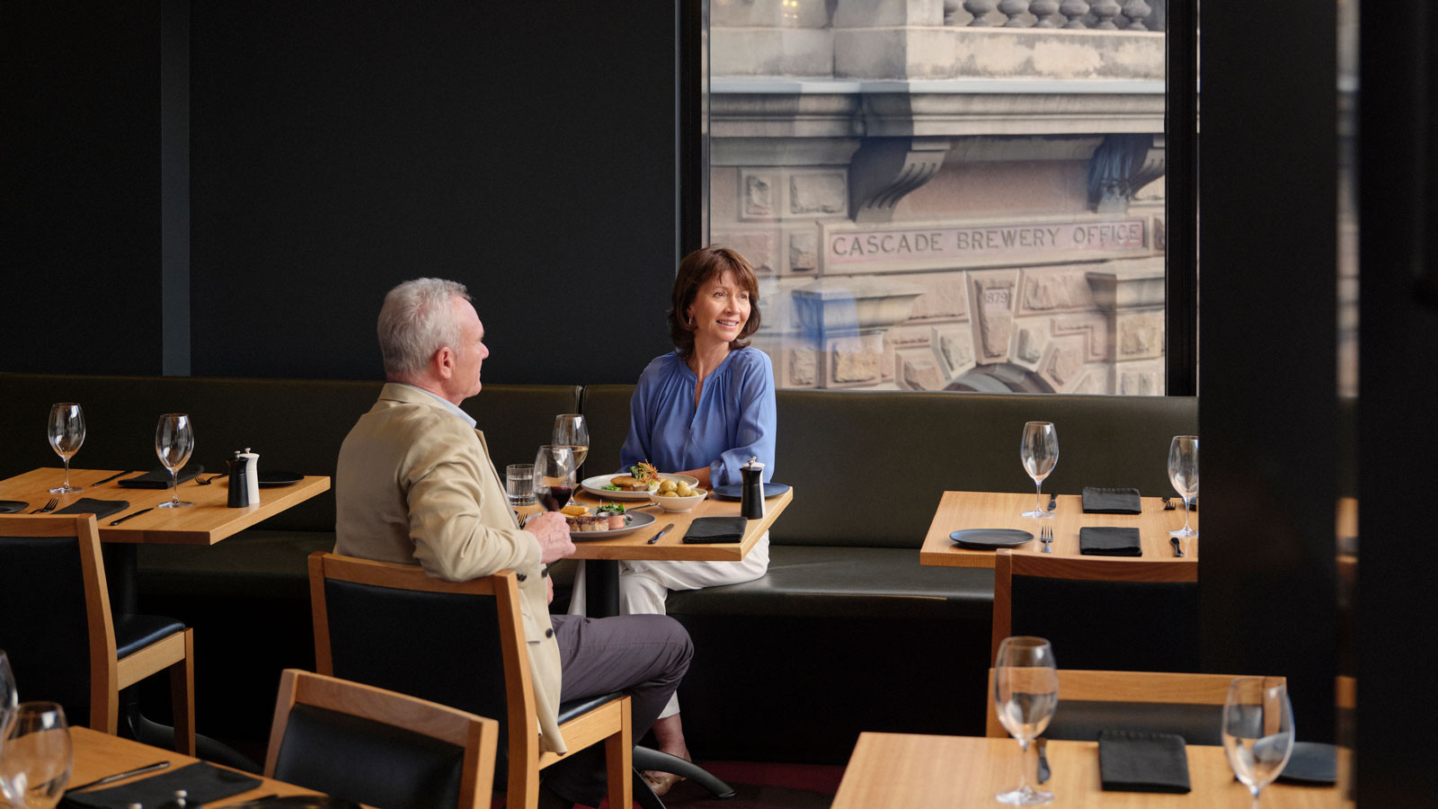 Couple enjoying a meal together at RACV Hobart Hotel