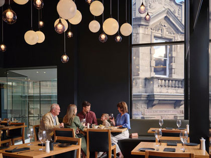 Family dining at Charcol restaraunt.