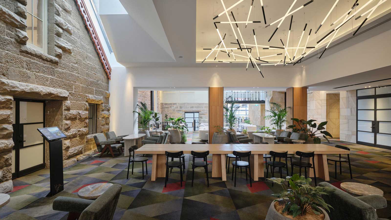 Seating areas in the lobby of Hobart Apartment Hotel