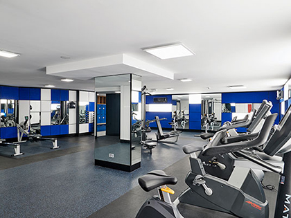 Gym at RACV Hobart Hotel, featuring exercise equipment.