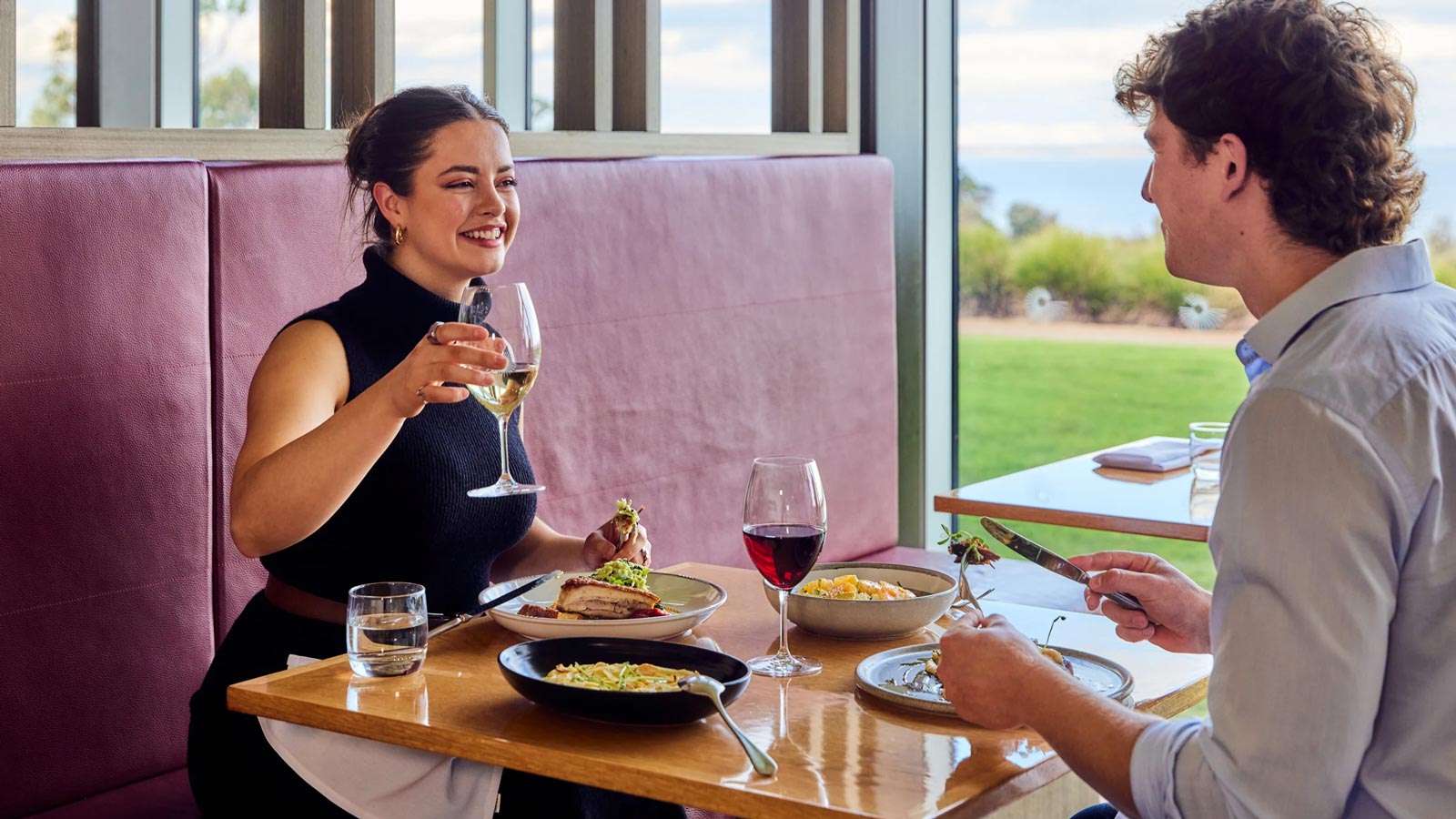 Couple eating a meal together at Radius