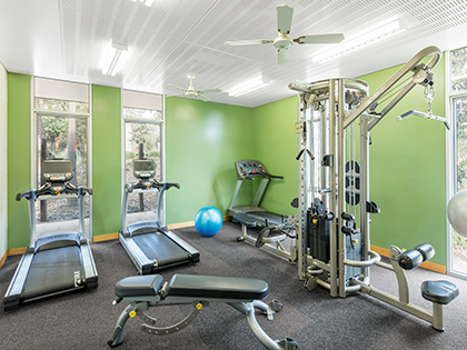 Treadmills, hanging weight machines and yoga balls at RACV Inverloch Resort's gym.