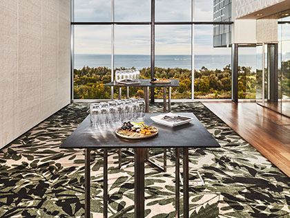 Pre-function space outside RACV Inverloch resort's Panorama ballroom, set up with nibbles and glasses.