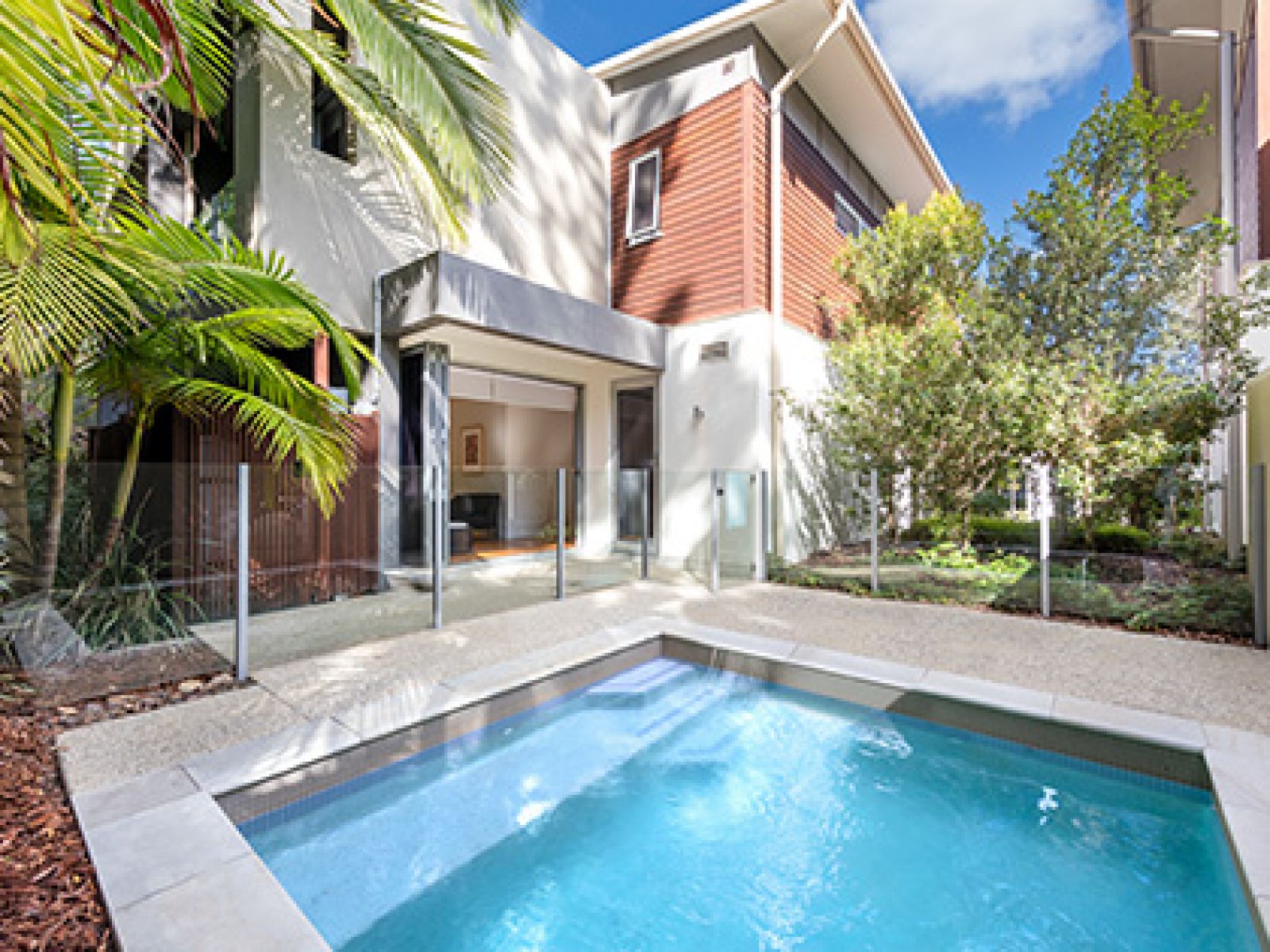 Three bedroom precinct villa private plunge pool surrounded by trees. 