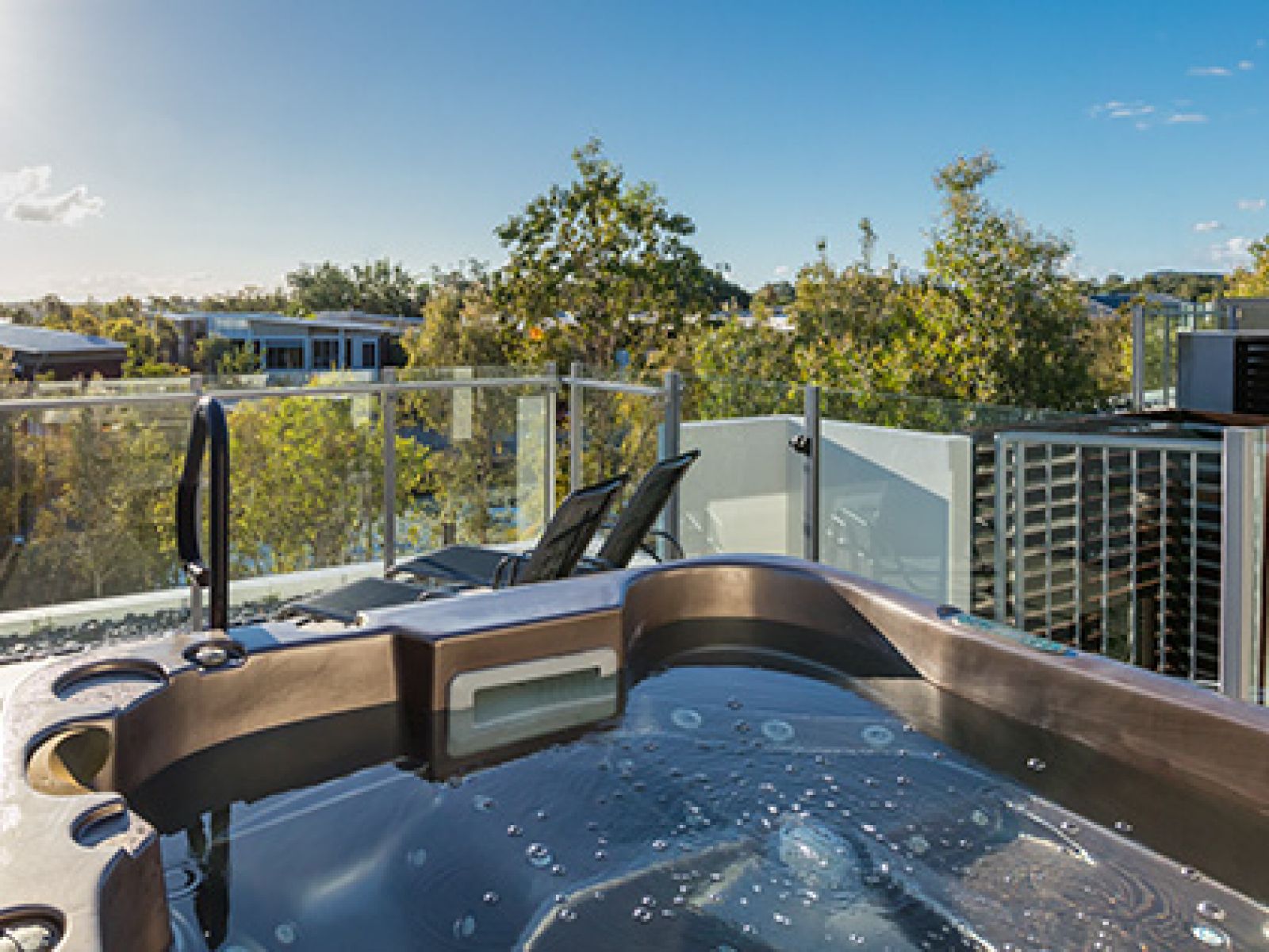 RACV Noosa Resorts three bedroom precinct villa rooftop spa overlooking the resort. 