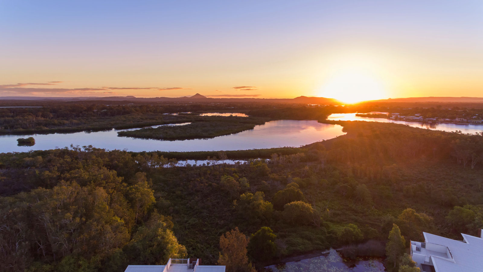Aerial views of waterways at sunset in Noosa.