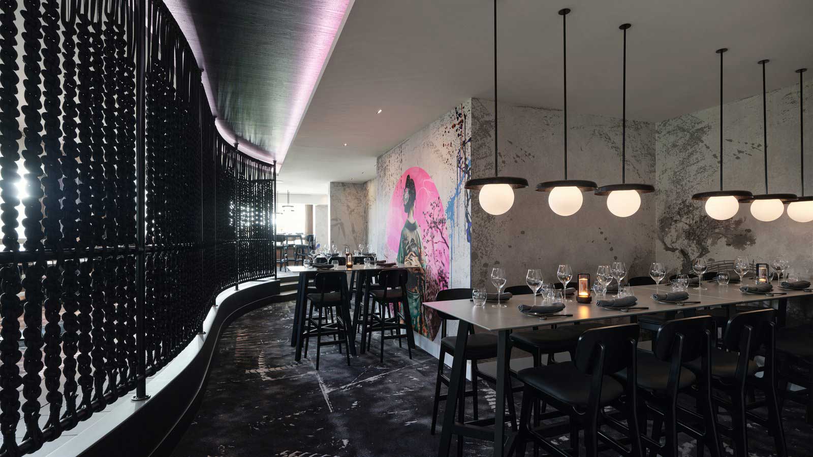 Painted murals on the walls at beautiful arakawa restaraunt.