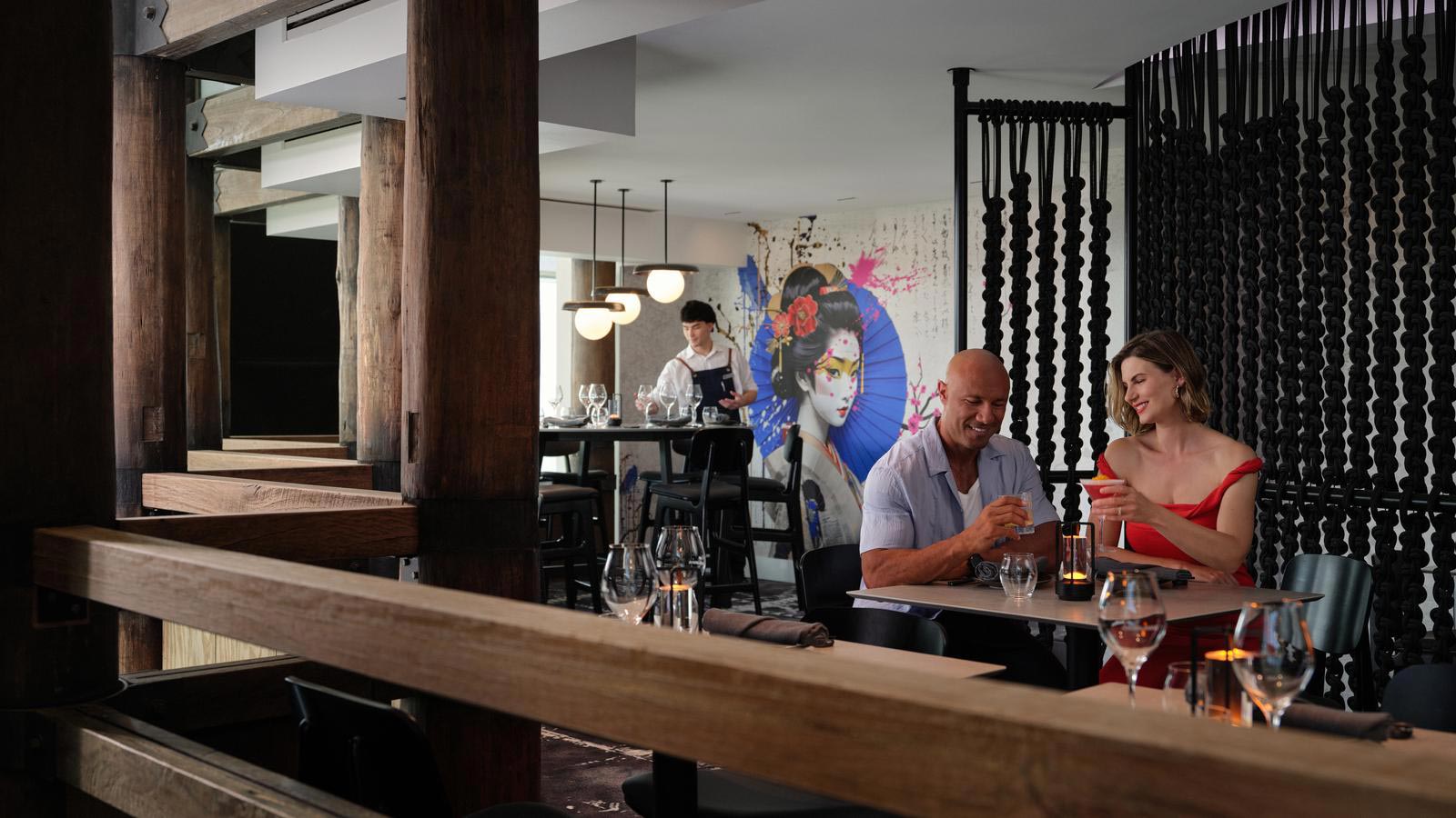Couple having a drink together in Arakawa restaurant