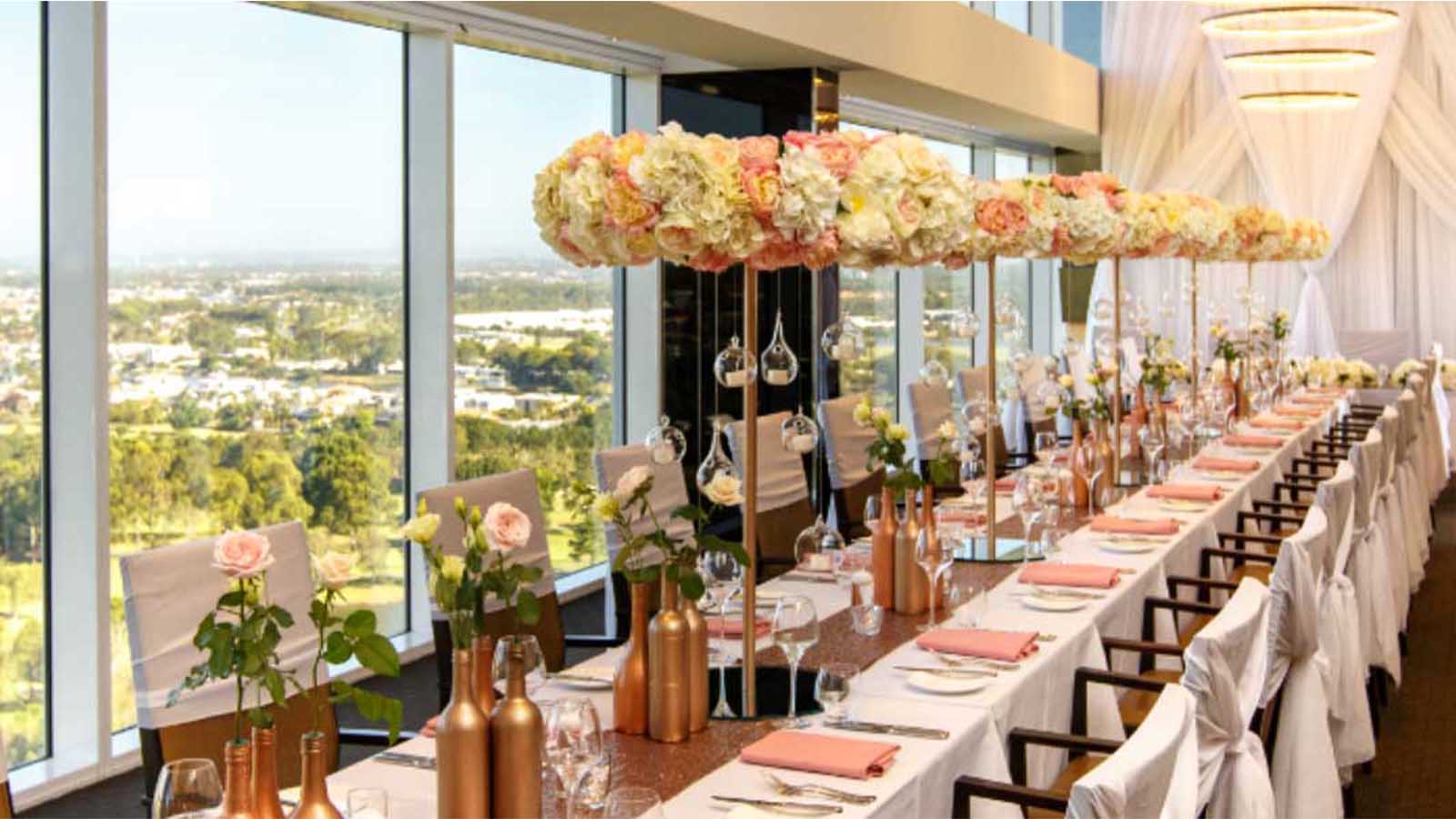 Table set-up for a wedding in the Videre restaurant and bar at Royal Pines.