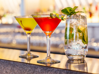 Cocktails in different glasses and in different colours