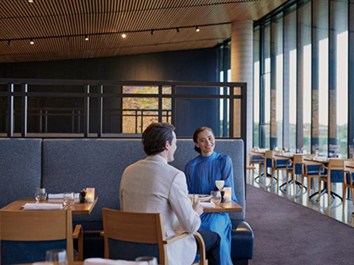 Couple sharing a meal at Number One restaurant at RACV Torquay Resort.